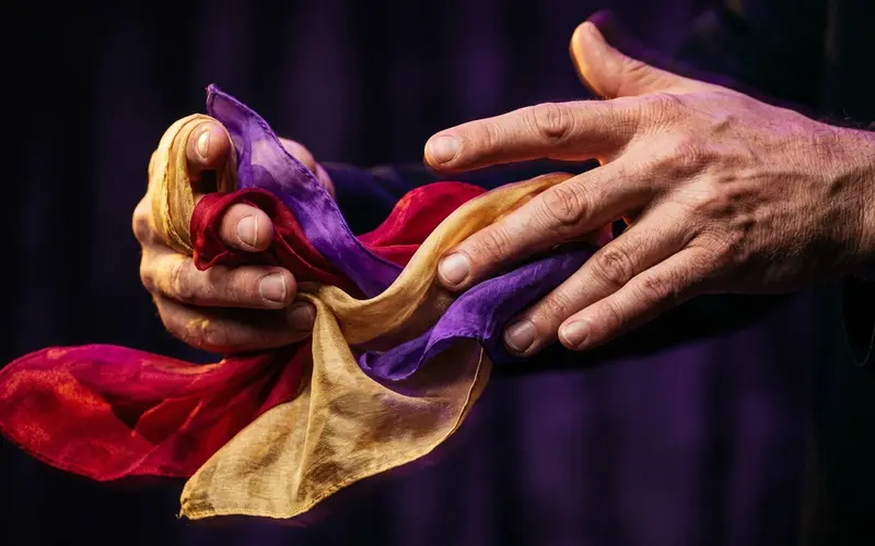 Close-up demonstration of palming a playing card